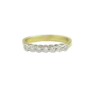 18ct. Yellow Gold Eternity Ring Set with 7 Diamonds in Platinum