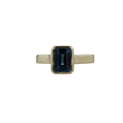 Bezel set London Blue Topaz Ring in 9ct Yellow Gold